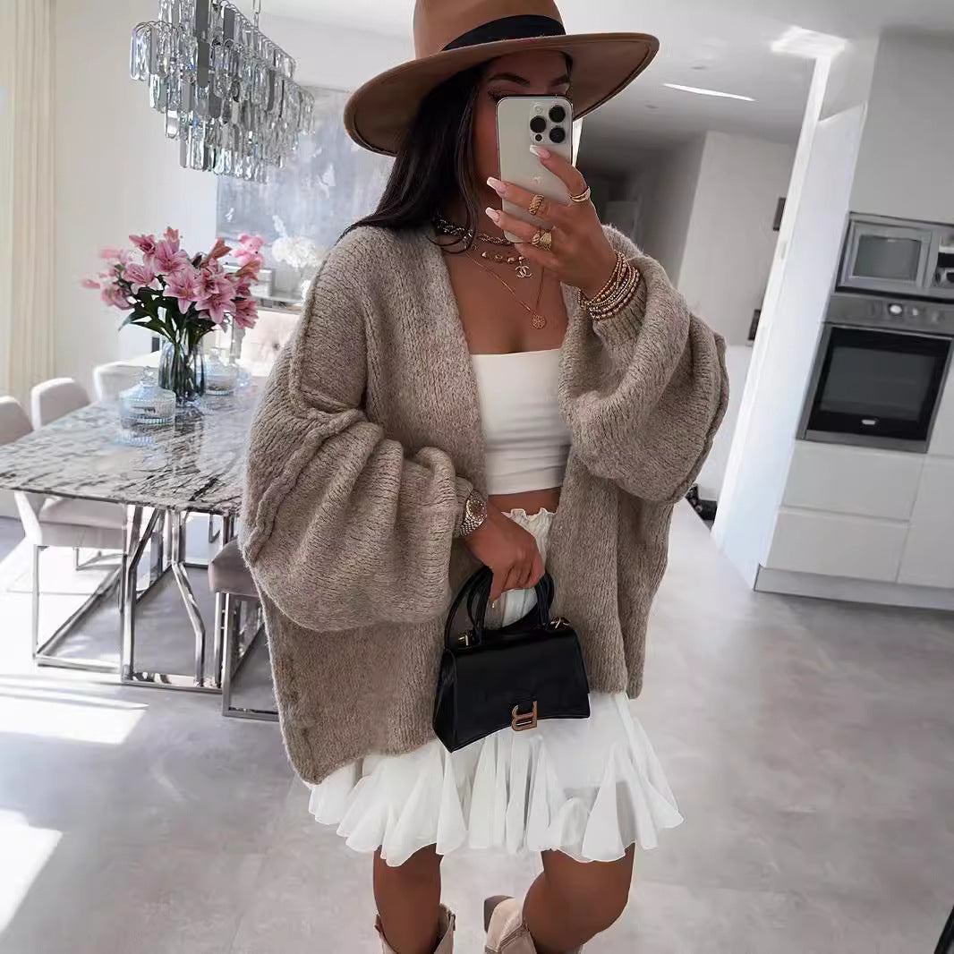 Loose solid color medium length knitted sweater cardigan jacket