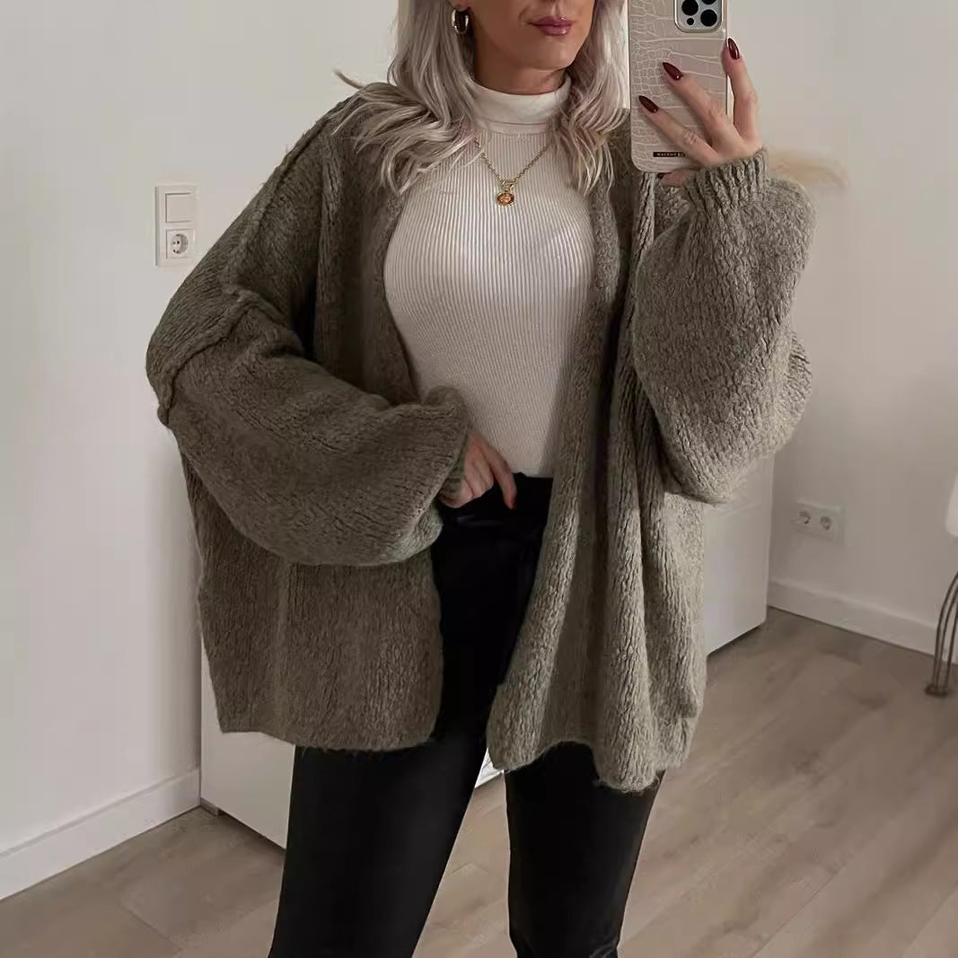 Loose solid color medium length knitted sweater cardigan jacket