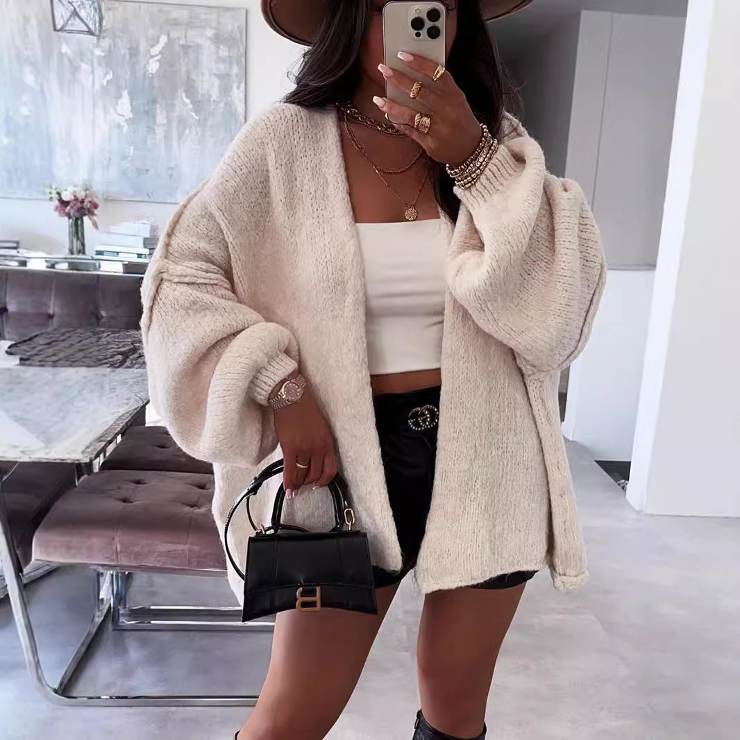 Loose solid color medium length knitted sweater cardigan jacket